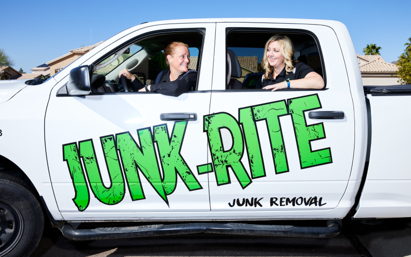 Junk-Rite co-owners in their truck