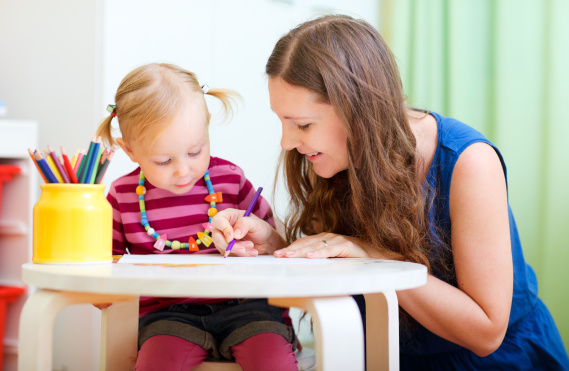 nanny coloring with young child