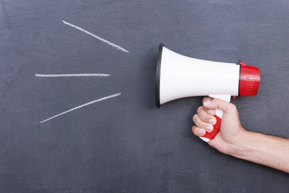 megaphone on chalkboard background