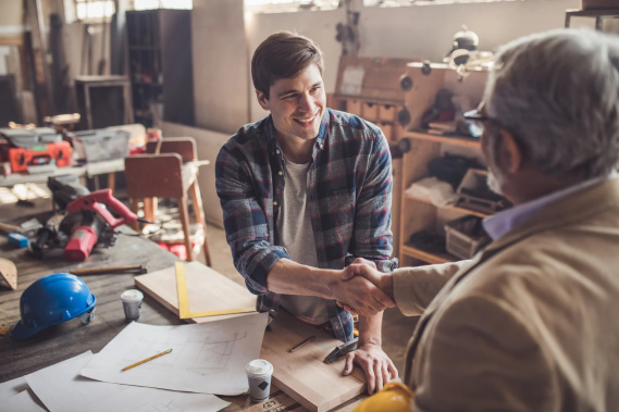 Contractor shaking hands with customer