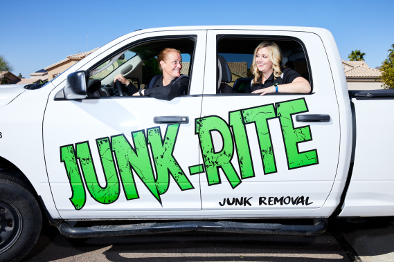 Junk-Rite co-owners in their truck