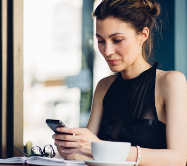 Woman looking at her phone.