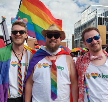 Keap image of three people at pride