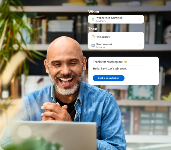 Man looking at a laptop excited