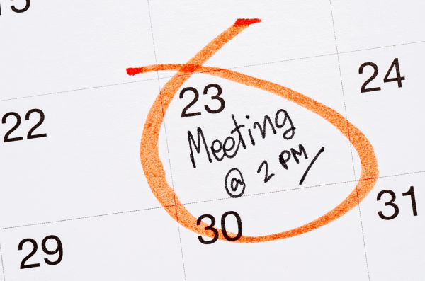Close up of calendar with scheduled meeting