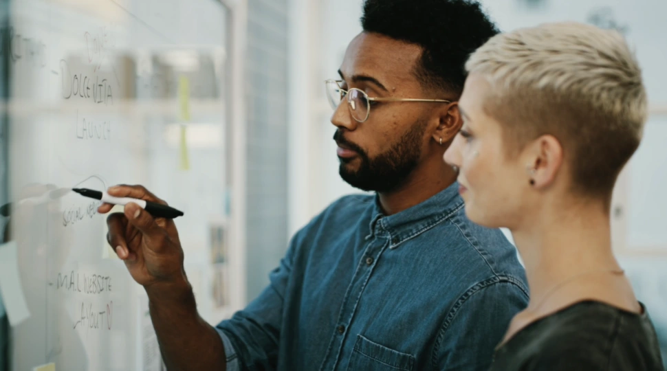 Screen shot of Scott in front of a whiteboard
