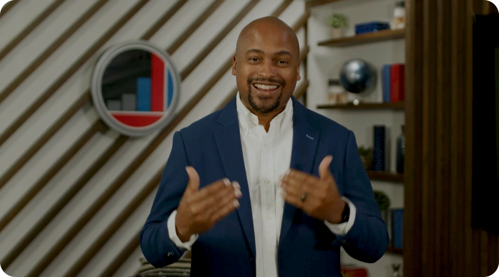 Lamar Tyler smiling with his hands up