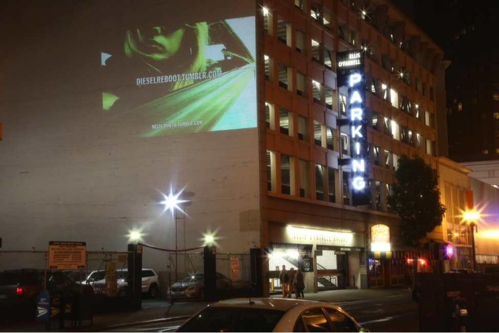 Guerrilla marketing: projecting video on building