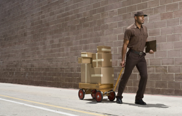delivery man in brown UPS uniform