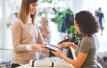 client paying on tablet