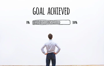 Man in front of goal progress bar