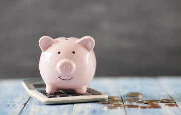 Piggy bank and calculator