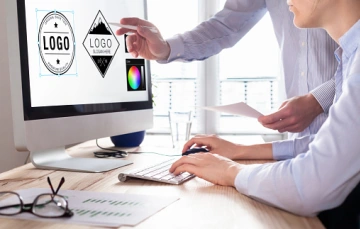Logo designs on a computer screen