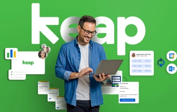 Man using a laptop in front of the 