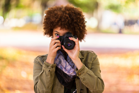 woman taking picture with nice camera