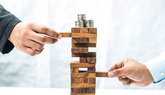 Coins on Jenga tower