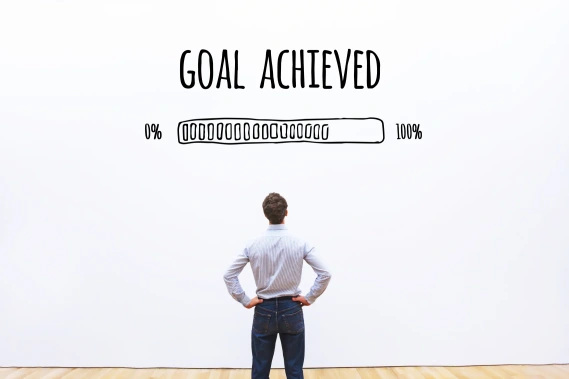 Man in front of goal progress bar