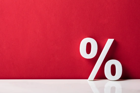 white % sign on red background