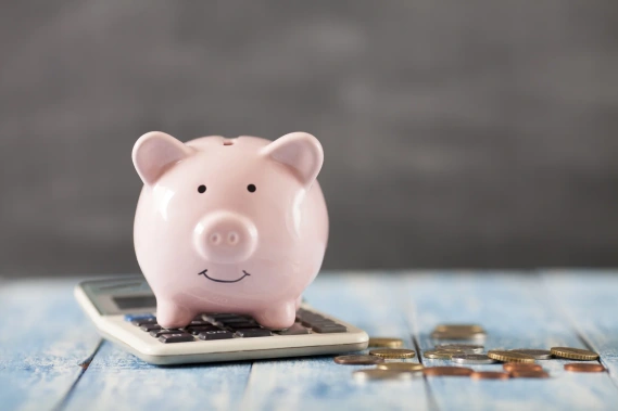 Piggy bank and calculator