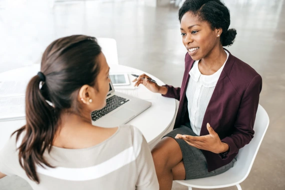 Business owner and client engaging in a conversation