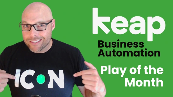 Keap's Brett Fairbourn smiling pointing at his shirt