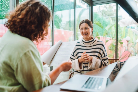 A woman smiling while going through her onboarding process
