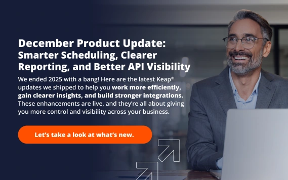 Keap December product update smarter scheduling clearer reporting better API visibility banner with business professional working on laptop.