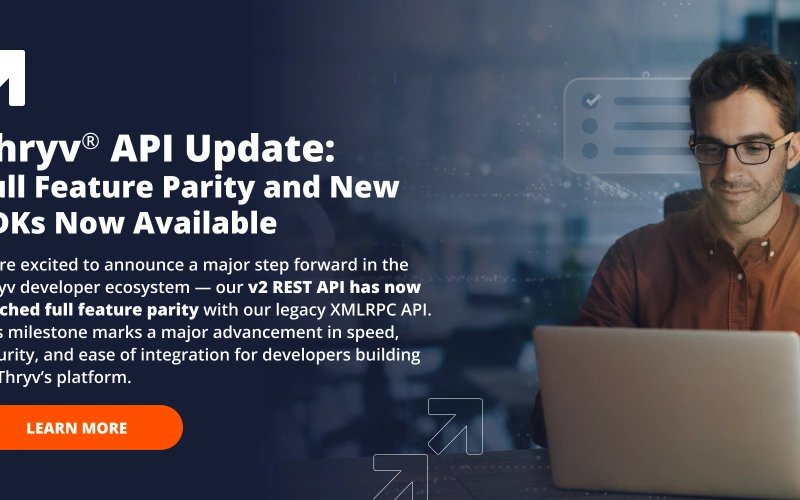 Thryv API update banner showing a developer working on a laptop with text ‘Thryv API Update: Full Feature Parity and New SDKs Now Available’ and an upward arrow icon